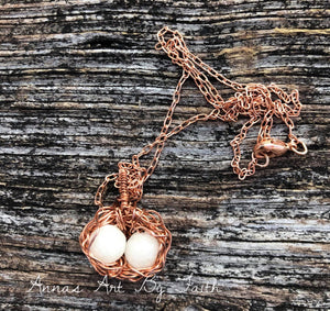 Birds nest keepsake pendant