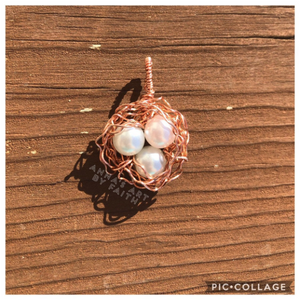 Birds nest keepsake pendant